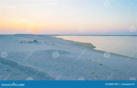 Artificial Island Under Construction in a Lake at Sunset Stock Photo - Image of beach, shore ...