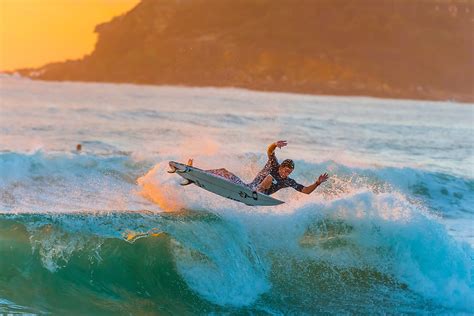 Surfing at sunrise, Manly Beach, Sydney, New South Wales, Australia | Blaine Harrington III