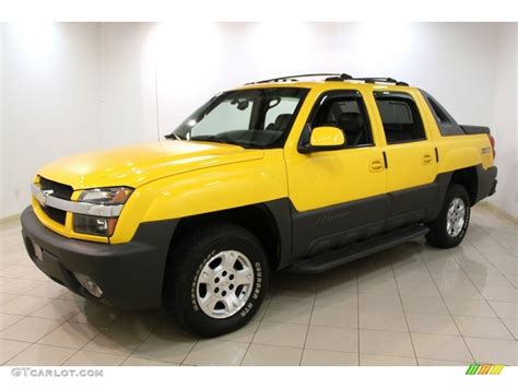 Yellow 2003 Chevrolet Avalanche 1500 Z71 4x4 Exterior Photo #74805944 ...