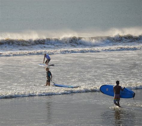 Kuta beach surfing action editorial stock image. Image of power - 23839954