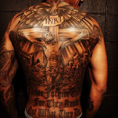 Check Out Nick Cannon’s Tattoo on His Back and His Other Skin Art