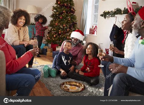 Multi Generation Family Celebrating Christmas Home Together Stock Photo ...