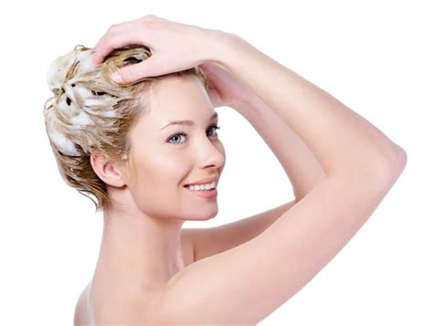 Woman washing hair with shampoo — Stock Photo © valuavitaly #4200292