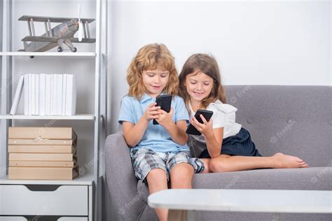 Premium Photo | Parental control kids alone with phone at home social ...