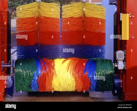 Colourful car wash brushes Stock Photo - Alamy