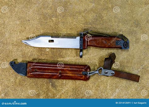 Bayonet Knife from AK-47 Kalashnikov Assault Rifle. Combat Knife on Wooden Background Stock ...