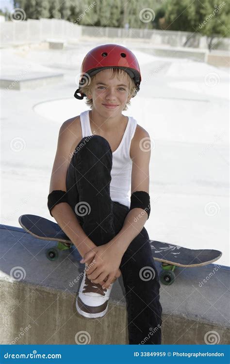 Teenage Boy with Skateboard Sitting in Skate Park Stock Image - Image of palm, confident: 33849959