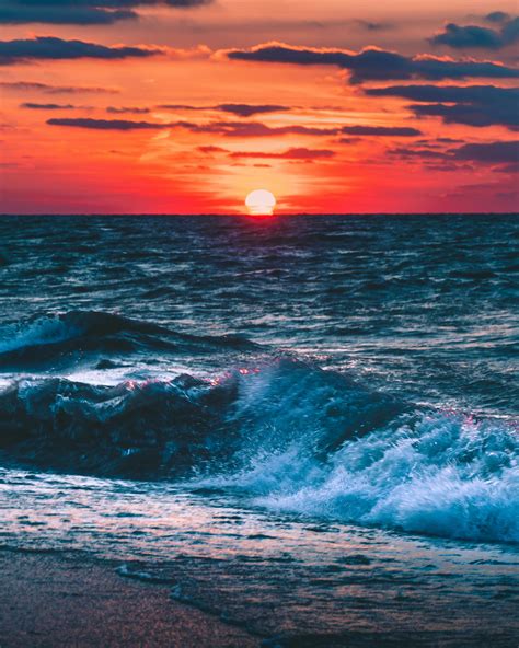 Photo of Ocean During Sunset · Free Stock Photo