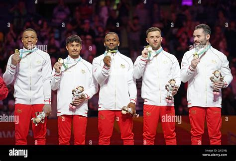 The England team with their gold medals after winning the Men's Team ...