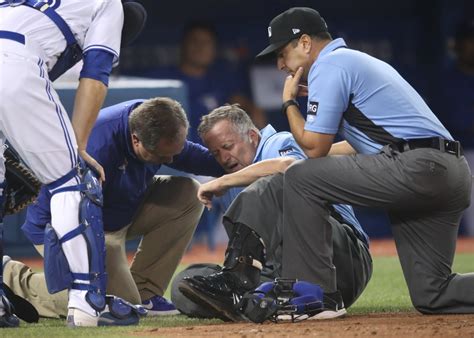 MLB umpire Dale Scott sustains concussion on foul tip from Mark Trumbo ...