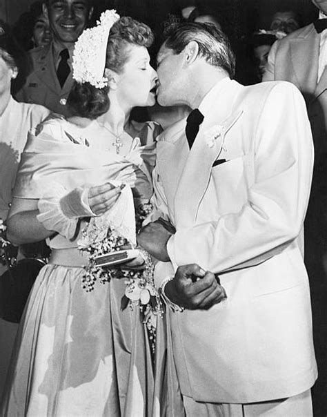 Lucille Ball Kisses Desi Arnaz at Wedding Pictures | Getty Images