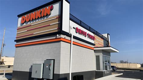 Coffee on the go! Dunkin' opens 1st drive-thru only location in ...