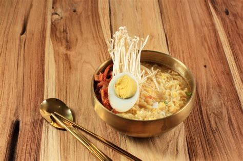 Premium Photo | Korean ramyeon instant noodle soup on golden