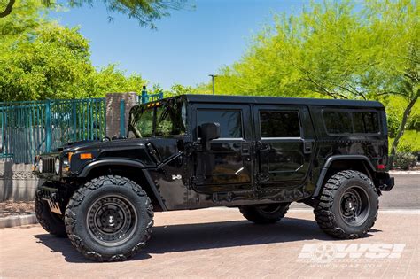 Lifted Hummer H1 on Black Rhino Armory 20x12 20 inch gunblack off road ...