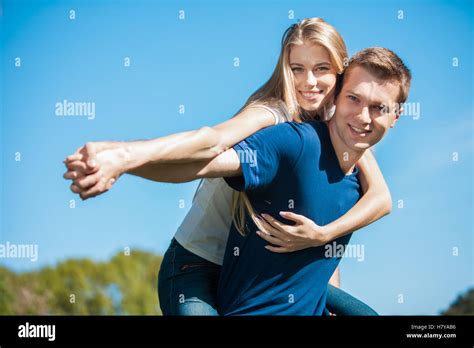 Happy young people outdoors Stock Photo - Alamy