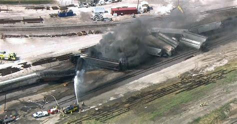 Train derails and catches fire in Illinois, triggering evacuations as smoke is seen for miles