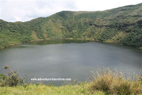 Hiking Mountain Bisoke Volcano Crater Lake Rwanda - African Adventure Travellers