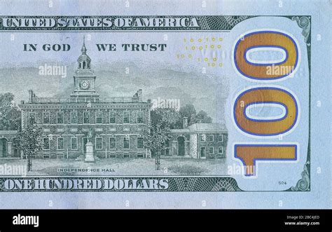 Independence Hall on 100 dollars banknote back side closeup macro fragment. United states ...