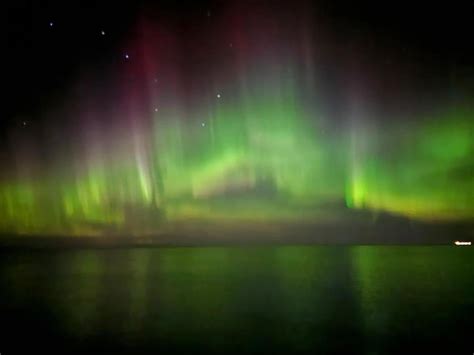 Aurora boreales over Lake Superior shot with my phone : r/space