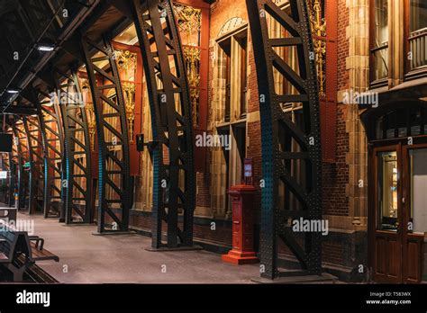 Amsterdam train station interior with warm light Stock Photo - Alamy