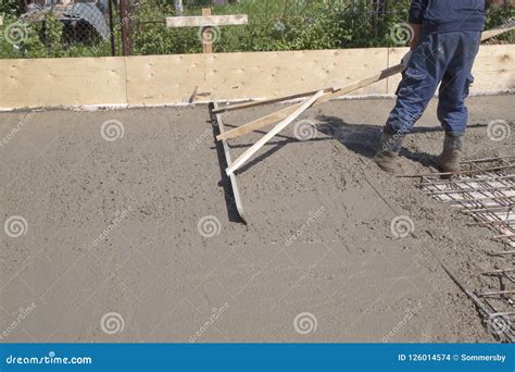 Worker Leveling Fresh Concrete Slab with Special Working Tool Stock Photo - Image of material ...