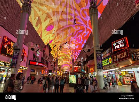 Las Vegas, Nevada. Fremont Street Experience Night Light Show. Four Zipline Riders above Stock ...