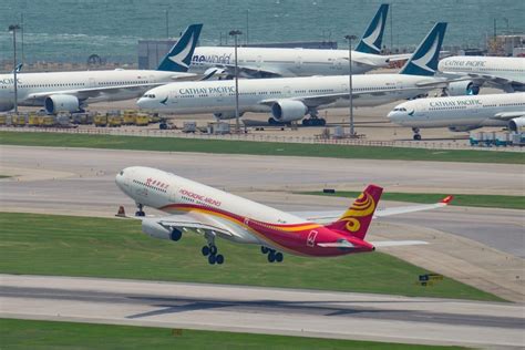 Hong Kong Airlines customers told to expect 2-hour wait online for free ...