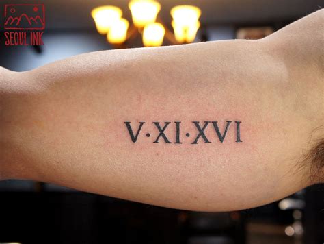 Roman Numeral Tattoo | Roman numbers tattoo, Roman numeral tattoo arm ...