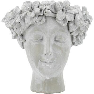 (eBay) Reminiscent of the Victorian era, this cement planter depicts a serene woman with a ...