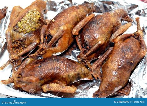 Egyptian Traditional Stuffed Pigeon Dish Filled with Freekeh and Rice, Oriental Roasted Pigeons ...