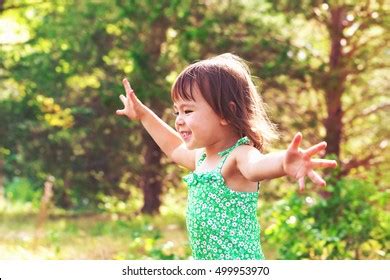 Happy Smiling Toddler Girl Playing Outside Stock Photo 499953970 | Shutterstock