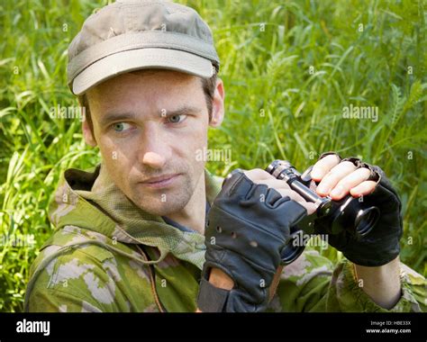 The young man conducts observation Stock Photo - Alamy