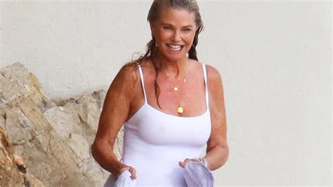 Christie Brinkley Wears Pink Swimsuit In The Turks & Caicos: Photos ...