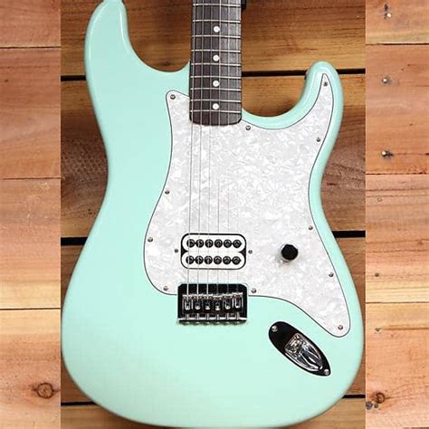 FENDER TOM DELONGE STRATOCASTER Seafoam Surf Green Strat | Reverb