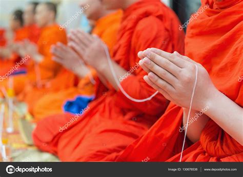 Buddhist monks chanting or Praying in Temple Thailand — Stock Photo © casanowe1 #130676538