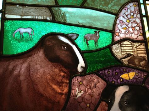 Stained Glass Window with Sheep and Flowers