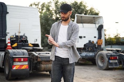 Premium Photo | Handsome and young truck driver in casual clothes