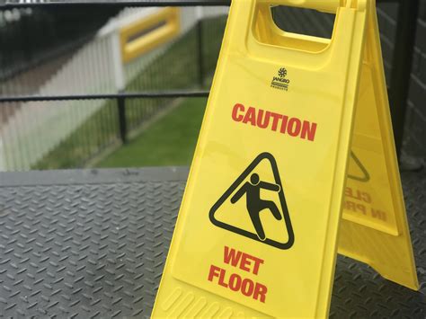 Stock photo image of a yellow 'caution wet floor' sign. | Flickr