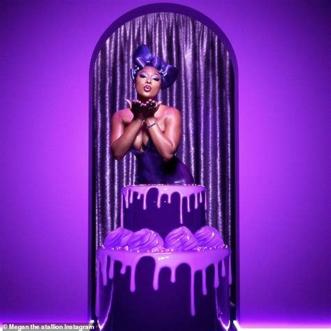 Megan Thee Stallion pops out of a cake in plunging purple latex to kick off her 26th birthday ...