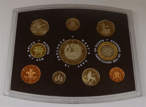 Six Royal Mint United Kingdom proof coin sets 2000, 2005, 2006, 2007 ...