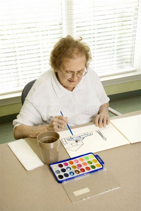 Elderly woman painting. Elderly Caucasian woman painting with watercolors at ret , #Ad, # ...