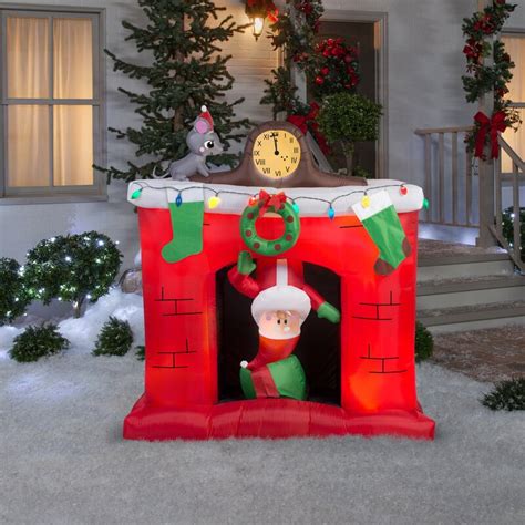 The Holiday Aisle Santa Claus Fireplace Scene Inflatable | Wayfair