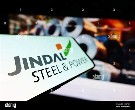 Smartphone with logo of company Jindal Steel and Power Limited (JSPL ...