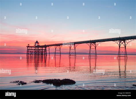 clevedon pier beach somerset at sunset Stock Photo - Alamy