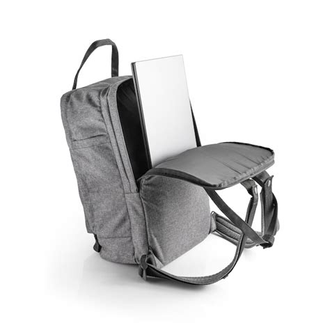 Premium Photo | Gray fabric backpack with a laptop in the back compartment Casual backpack