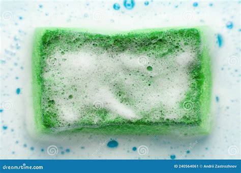 Sponge for Washing Dishes in Foam. House Cleaning Stock Image - Image ...