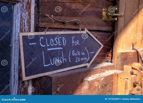 `Closed for Lunch` Sign at a Barn Wall Stock Image - Image of posted, background: 131553699