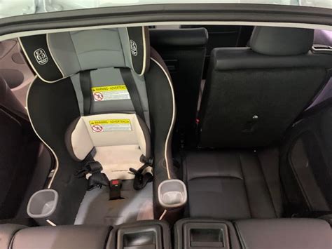 Tesla Model Y Third Row with Rear-Facing Car Seats: How Much Room is There? [PICS] - TeslaNorth.com