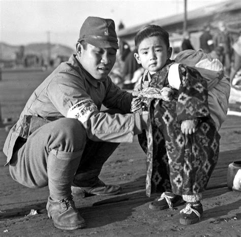Busan: Japanese soldier and son, December 1945. "At the docks in Fusan, Koreans had been brought ...