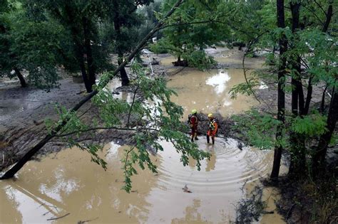 Heatwave gives way to deluges as flash-flooding forces thousands to ...